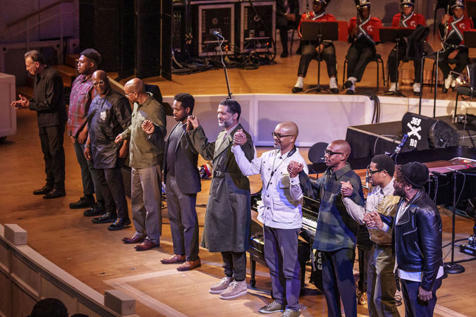 Wide bow shot of Jason Moran and fellow musicians on stage