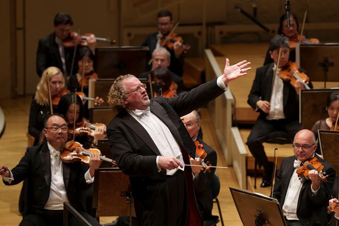 conductor raising hand