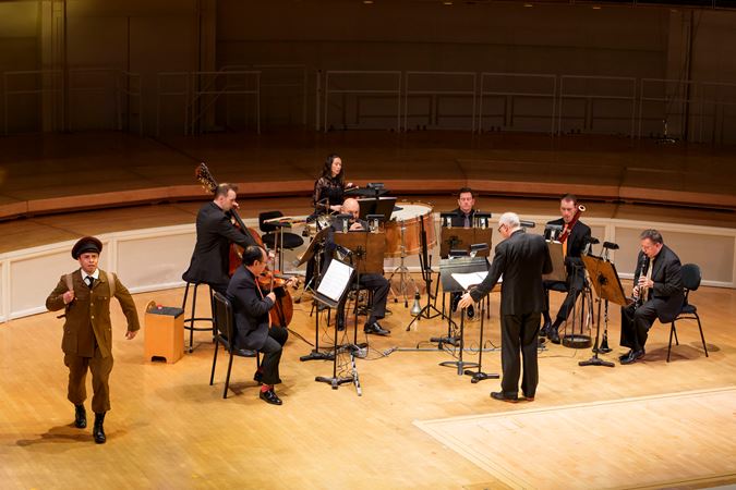 Closeup of an actor (the soldier) from The Goodman performing The Soldier's Tale with the Chicago Symphony Orchestra