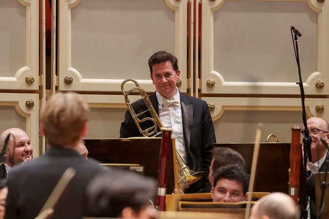 A bow shot of guest trombone Timothy Higgins
