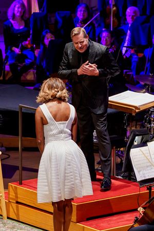 Singer Heather Headley bows to conductor Steven Reineke at the end of the proram