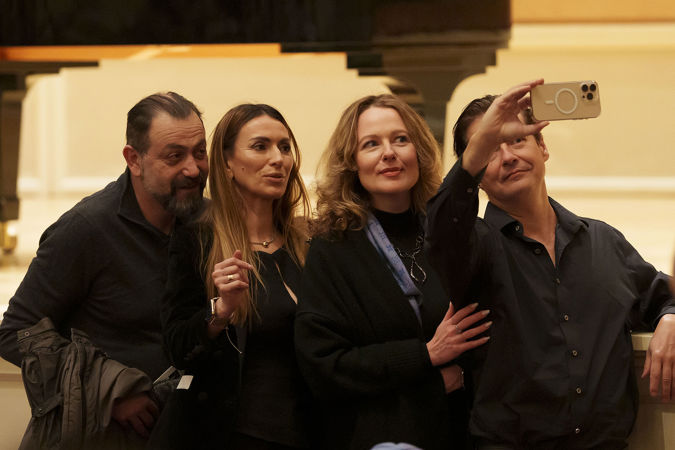 Audience members taking a selfie on the main floor
