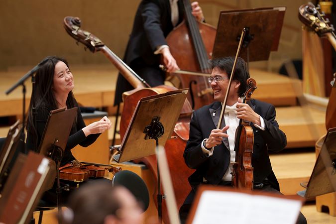 all smiles before the concert from violists Weijing Michal and Youming Chen