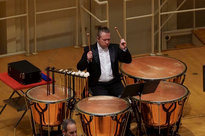 Assistant Principal Timpani and Percussion Vadim Karpinos playing the timpani