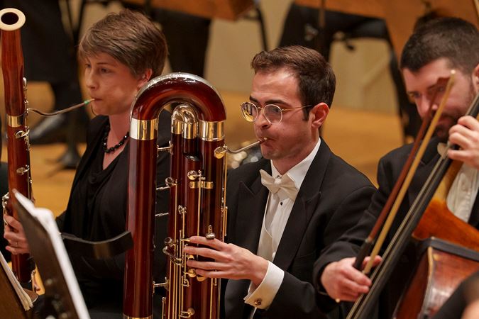 Closeup of a CSO musician playing the contrabasson