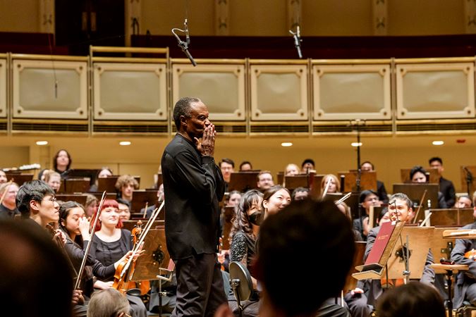Thomas Wilkins Walking On Stage During A Standing Ovation