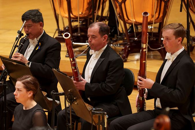 Closeup of Assistant Principal Bassoon William Buchman playing the bassoon