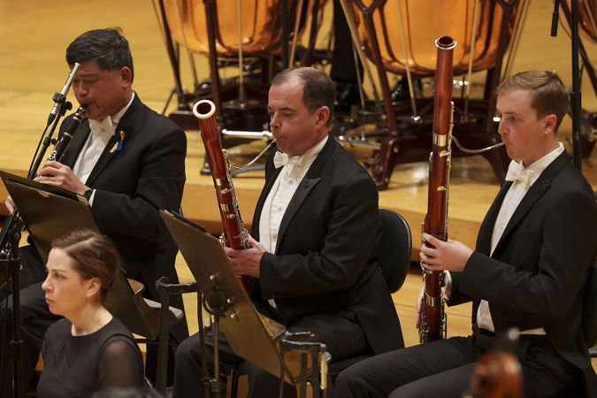 Closeup of Assistant Principal Bassoon William Buchman playing the bassoon