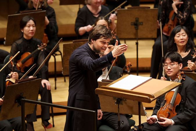 conductor acknowledging performer