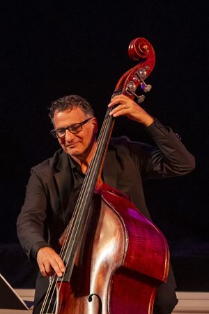 jazz bassist smiling