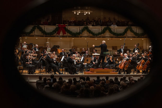 Wide shot of the CSO and conductor Gianandrea Noseda on stage