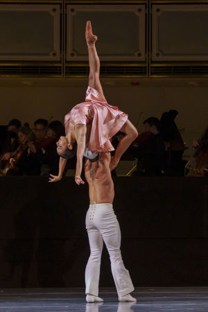 A closeup of two The Joffrey Ballet dancers from Blanc's world premiere choreography titled Les Bœufoons