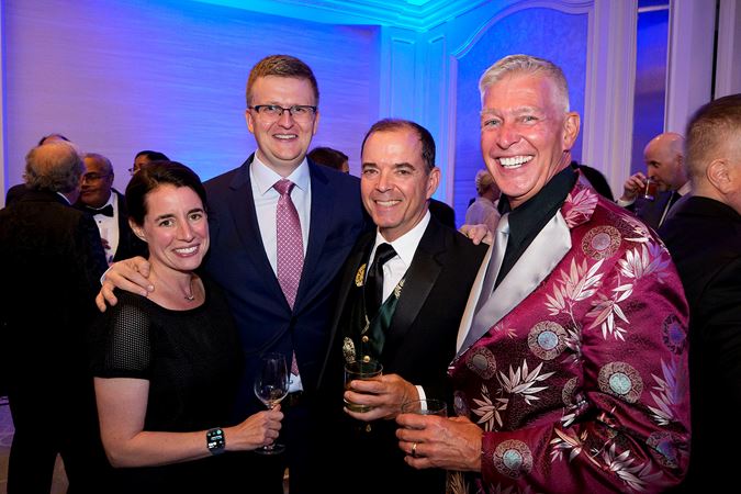 Group shot of CSO principal horn Mark Almond and his wife with CSO cello Brant Taylor and friend