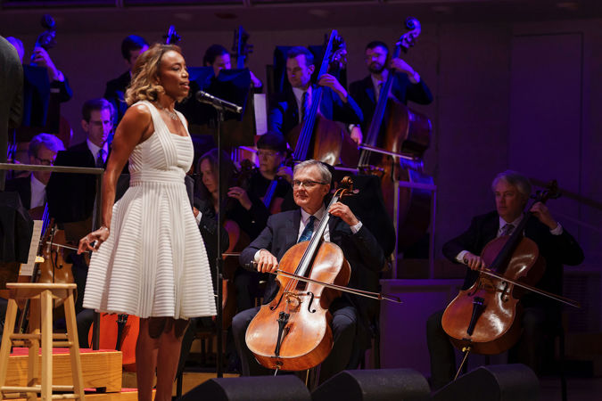 Closeup of Heather Headley singing on stage