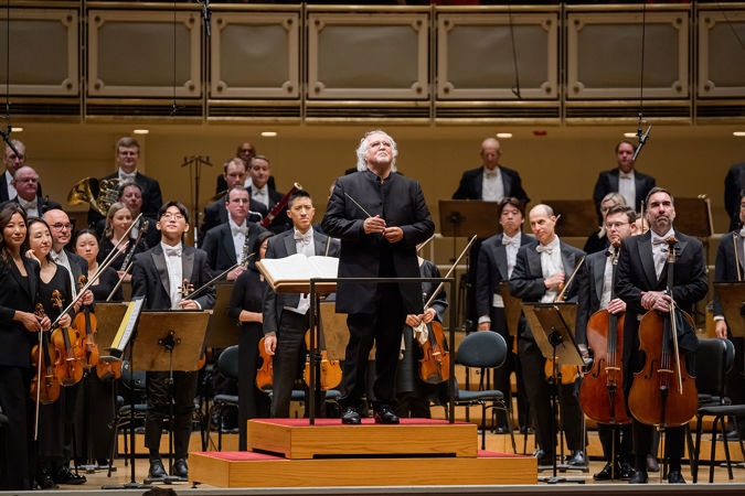 orchestra conductor bowing