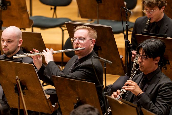 Closeup action shot of a Civic flutist and oboist