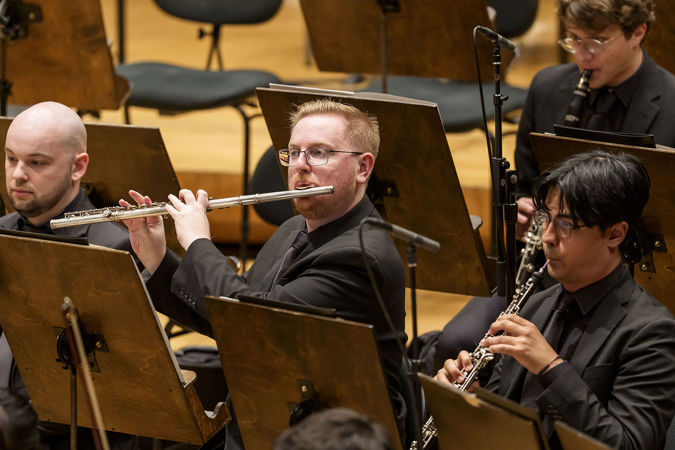 Closeup action shot of a Civic flutist and oboist