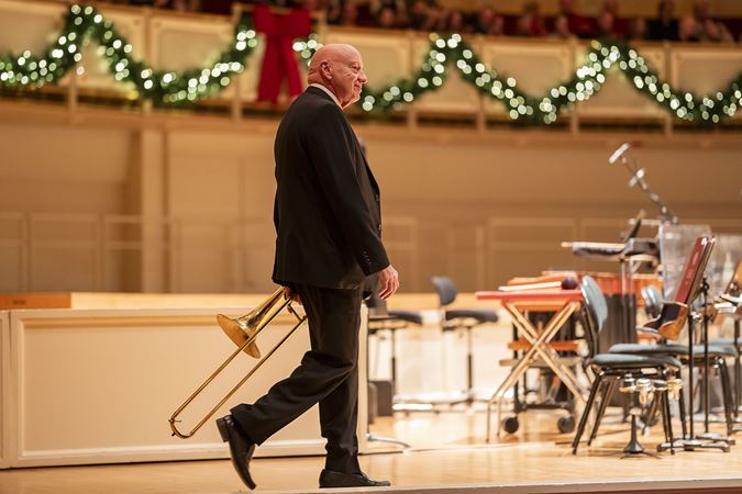 CSO bass trombone and trombone player Charles Vernon walks onstage