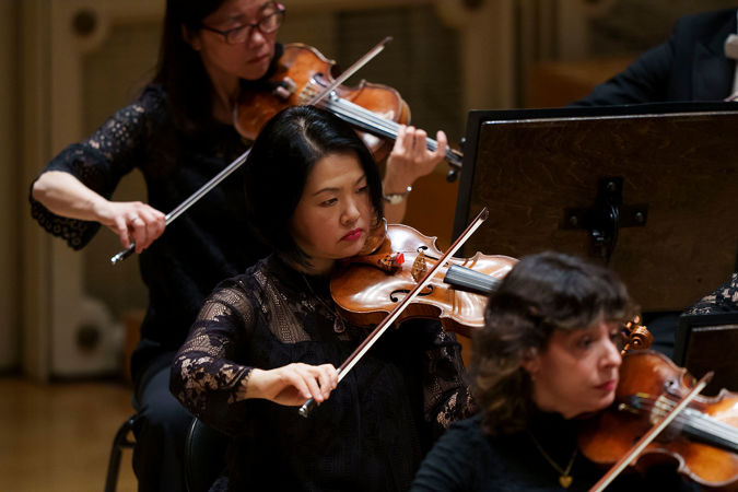 violinists playing