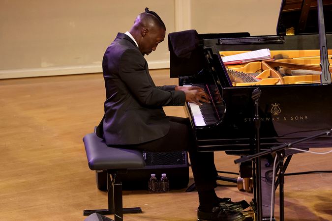 Closeup shot of pianist Paul Cornish on stage