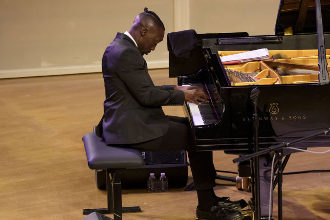 Closeup shot of pianist Paul Cornish on stage