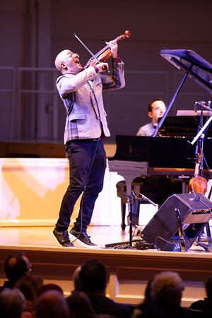 Daniel Bernard Roumain plays an energetic violin solo