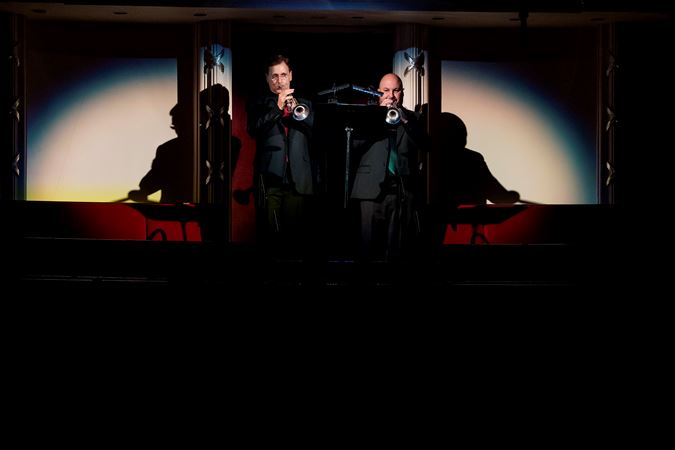 Closeup of CSO trumpets John Hagstrom (left) and Esteban Batallán (right) performing from the terrace