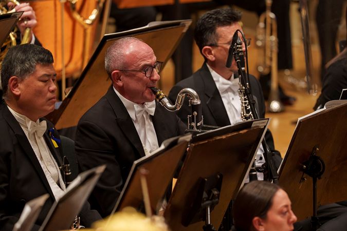 Closeup shot of a CSO musician playing the bass clarinet
