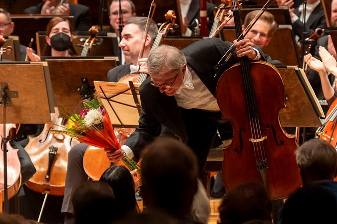 cello soloist receiving flowers