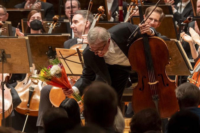 cello soloist receiving flowers