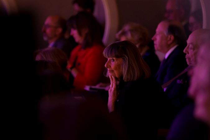 Closeup of an audience member sitting in a Box