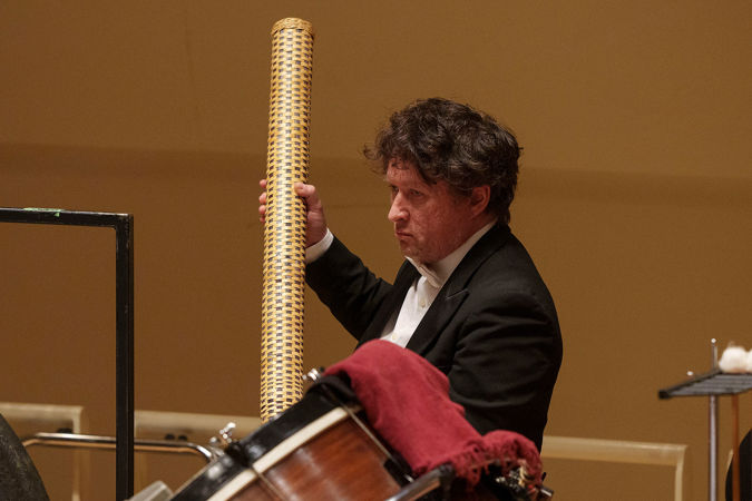 percussionist playing rainstick