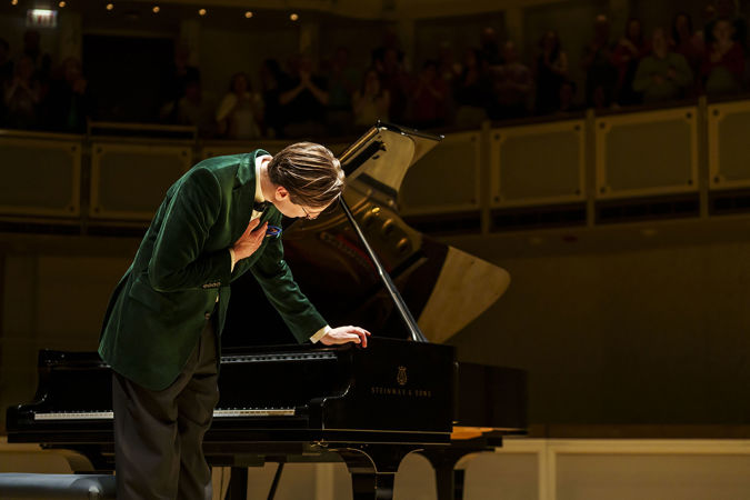 Closeup bow shot of pianist Víkingur Ólafsson