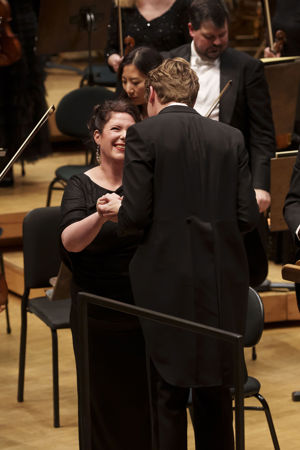 Zell Music Director Designate Klaus Mäkelä congratulating contralto Wiebke Lehmkuhl on stage