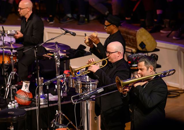 the brass section of Pink Martini