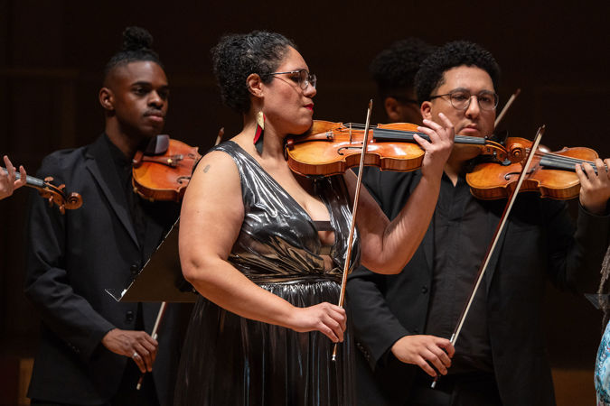 Jessie Montgomery performs as guest violinist during her own piece, Rounds