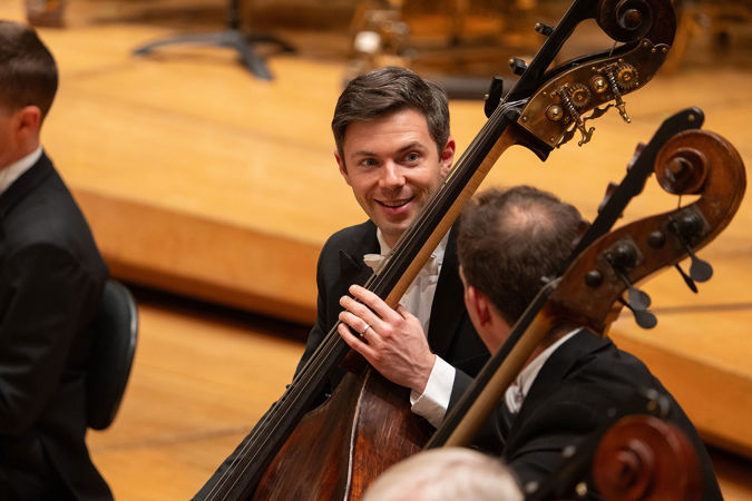 Closeup shot of CSO bass Ian Hallas on stage