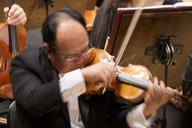 CSO concertmaster Robert Chen is a blur of motion during his solo in Ein Heldenleben