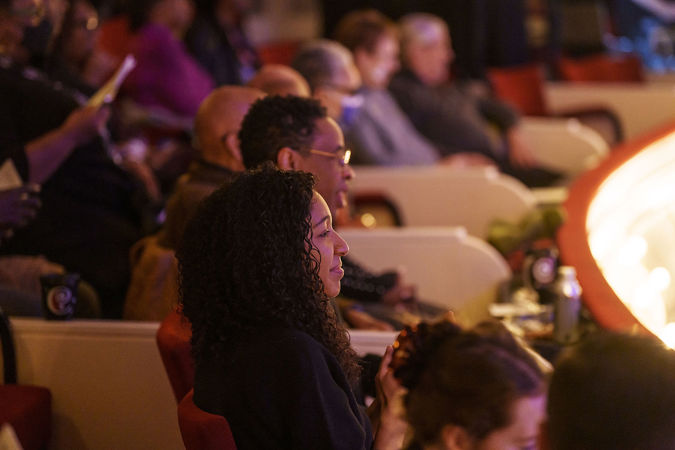 Sideview of patrons enjoying the concert from the box level