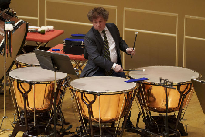 Closeup of CSO percussion Vadim Karpinos playing the timpani