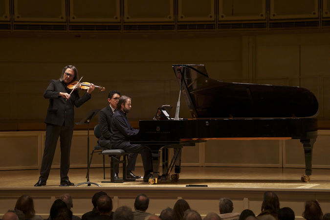 Leonidas Kavakos & Daniil Trifonov performing on stage