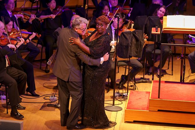 soloist and conductor dancing