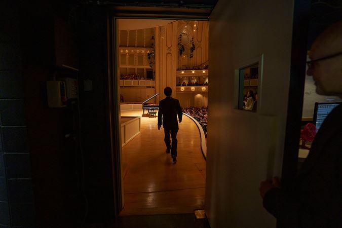 Kissin walking onstage