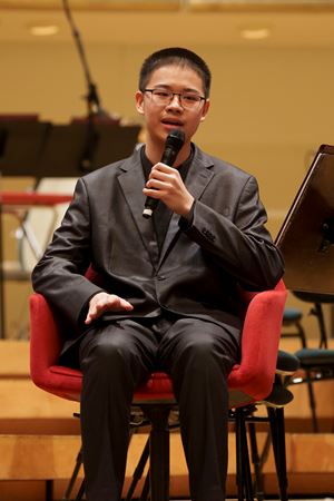 2025 Young Artists Competition finalist Tong-Bai Deng speaking at a post concert Q&A
