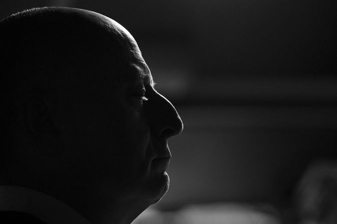 black and white close up: conductor Paavo Järvi gets serious backstage before the performance