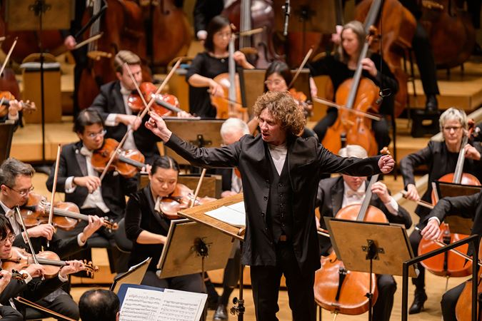 A close up of conductor Santtu-Matias Rouvali on the podium