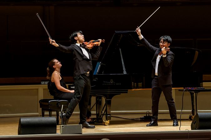 Sophie, Eddy and Brett perform their final note with a flourish