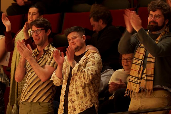 audience members give the CSO a standing ovation