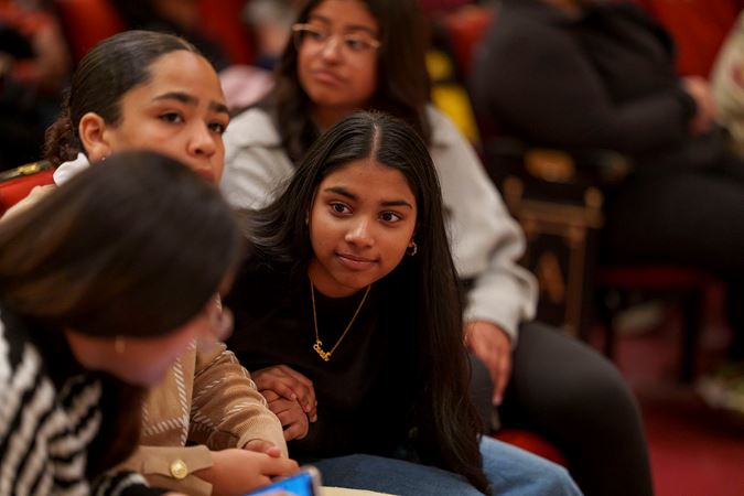 A young audience member chatting with friends on the Main Floor before the CSO for Kids concert