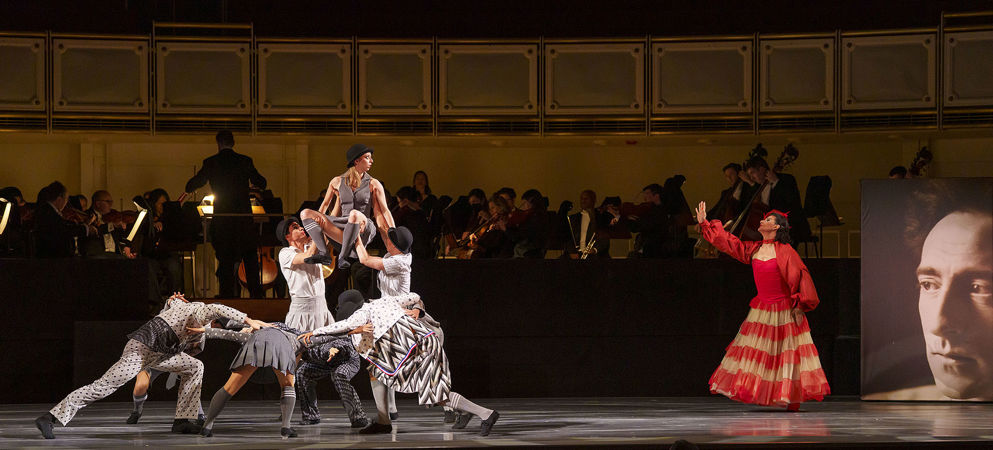 An action shot of The Joffrey Ballet dancers from Blanc's world premiere choreography titled Les Bœufoons